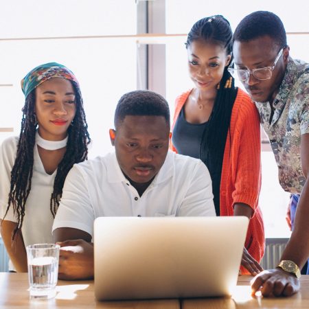 Group of afro americans working together Group of afro americans working together